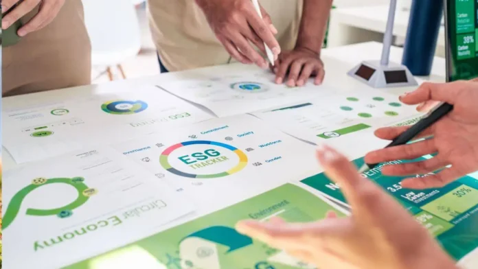 Business team reviewing ESG compliance check report