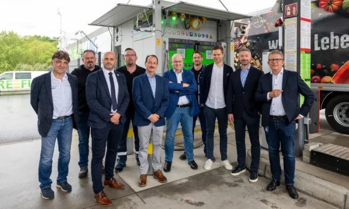 EDEKA Minden-Hannover Bio-LNG station opening with company and partner representatives at Mittenwalde site